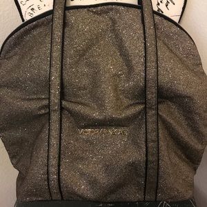 Victoria’s Secret glittery gold overnight bag